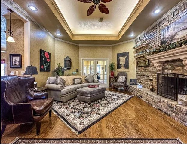 a living room with furniture and a rug