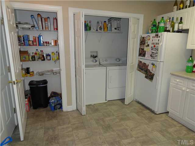 929 Morreene Road, Unit C34 Durham, NC 27705 - Photo 11 of 23 Great pantry storage in the kitchen. Washer and dryer are included in the sale of the unit. Laundry Room