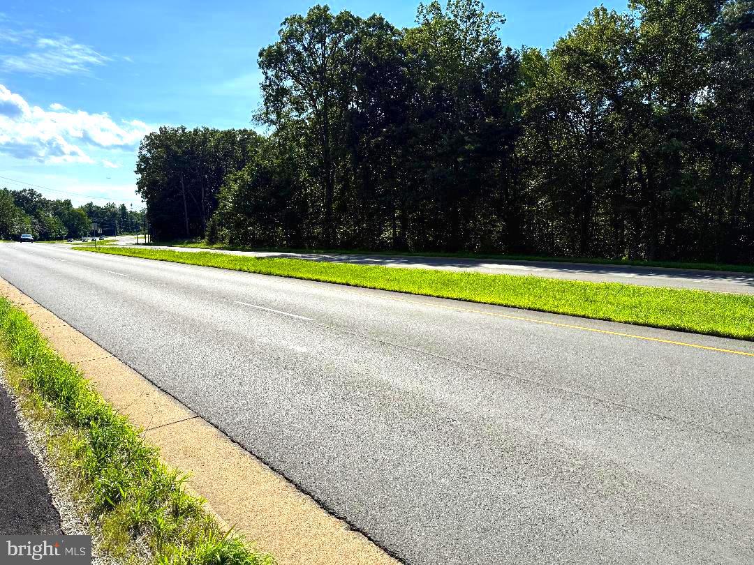 a view of swimming pool with an outdoor space and seating area