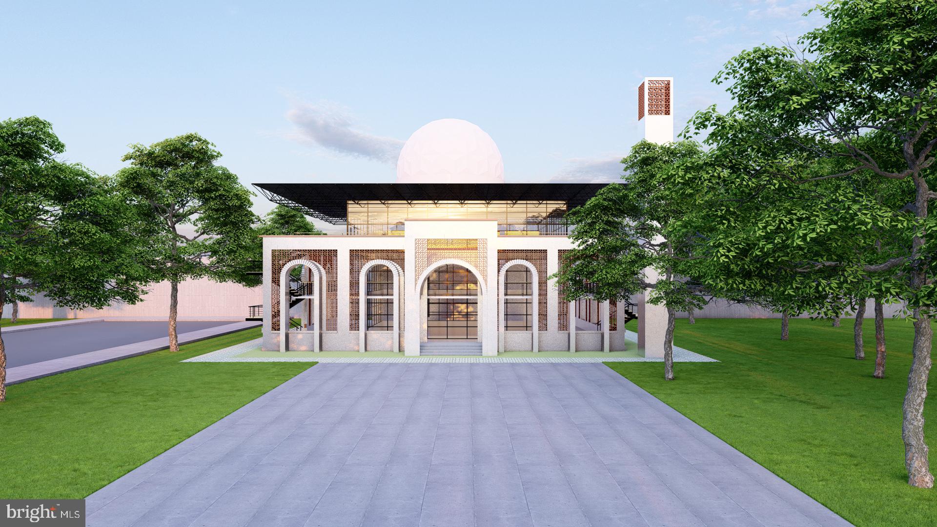 11625 Braddock Road Fairfax, VA 22030 - Photo 5 of 11 a front view of a house with garden and trees