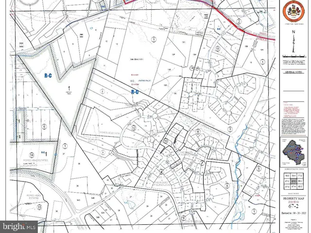 a close up of a white wall with a shower curtain