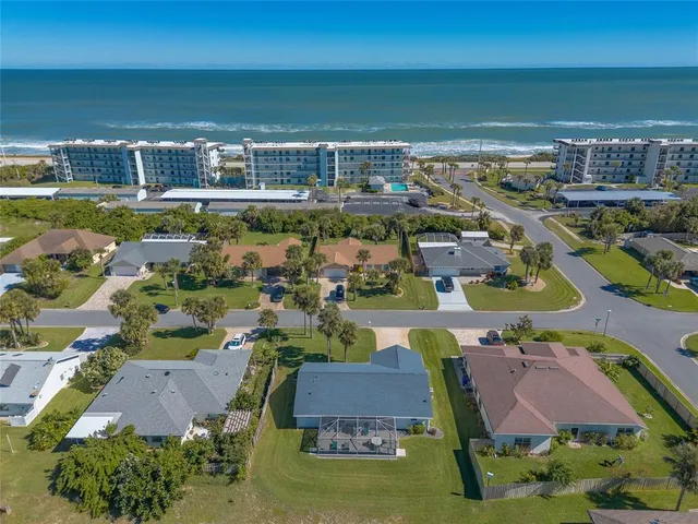 a view of a city with an ocean view