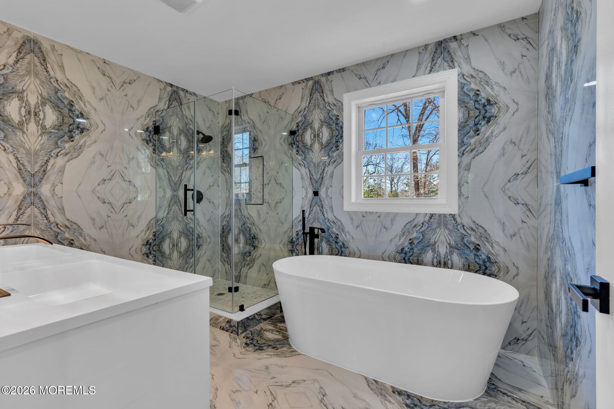 58 Fish Hawk Drive Middletown, NJ 07748 - Photo 16 of 33 a view of a bathtub in a bathroom