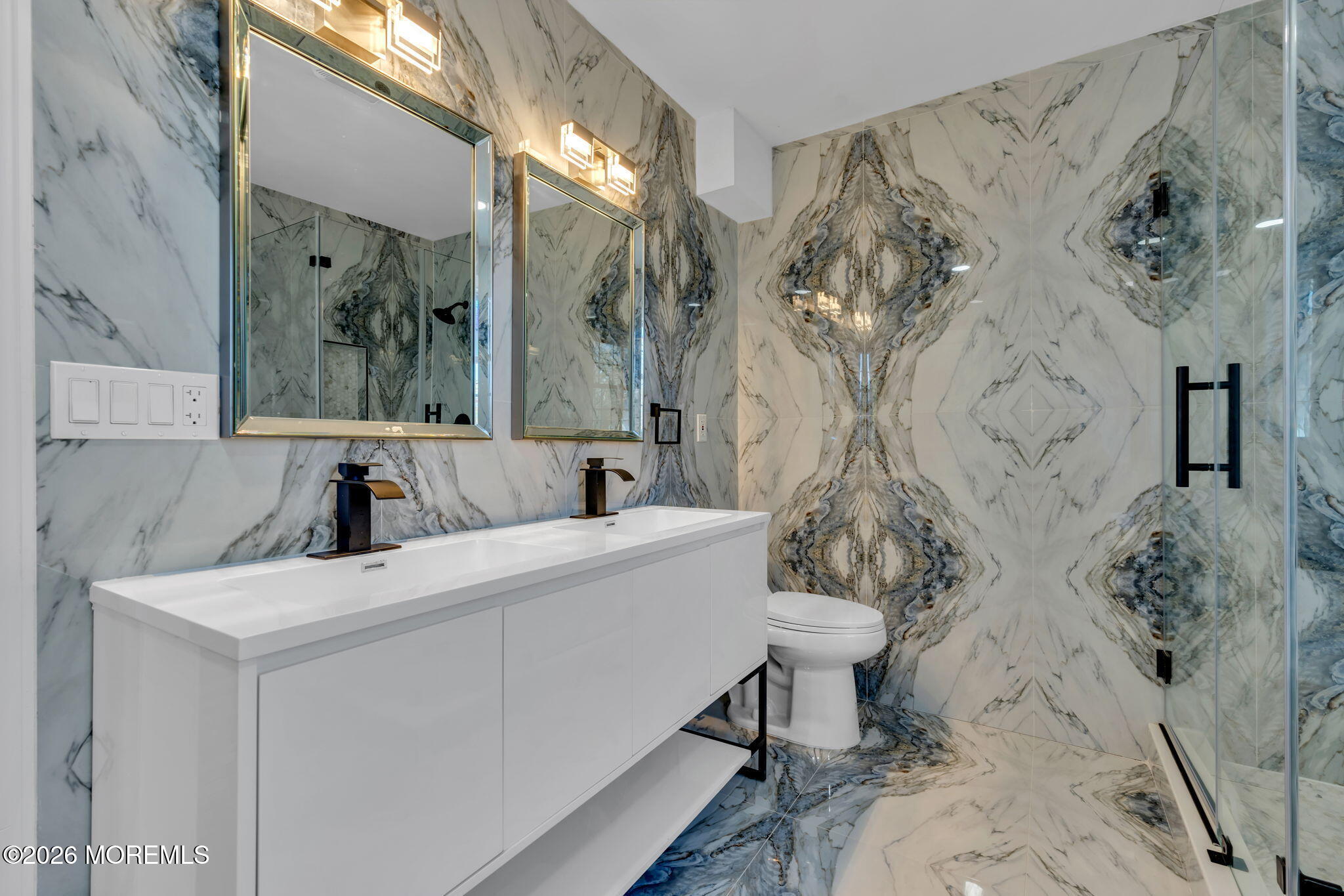 58 Fish Hawk Drive Middletown, NJ 07748 - Photo 18 of 33 a view of a bathroom with a sink and mirror