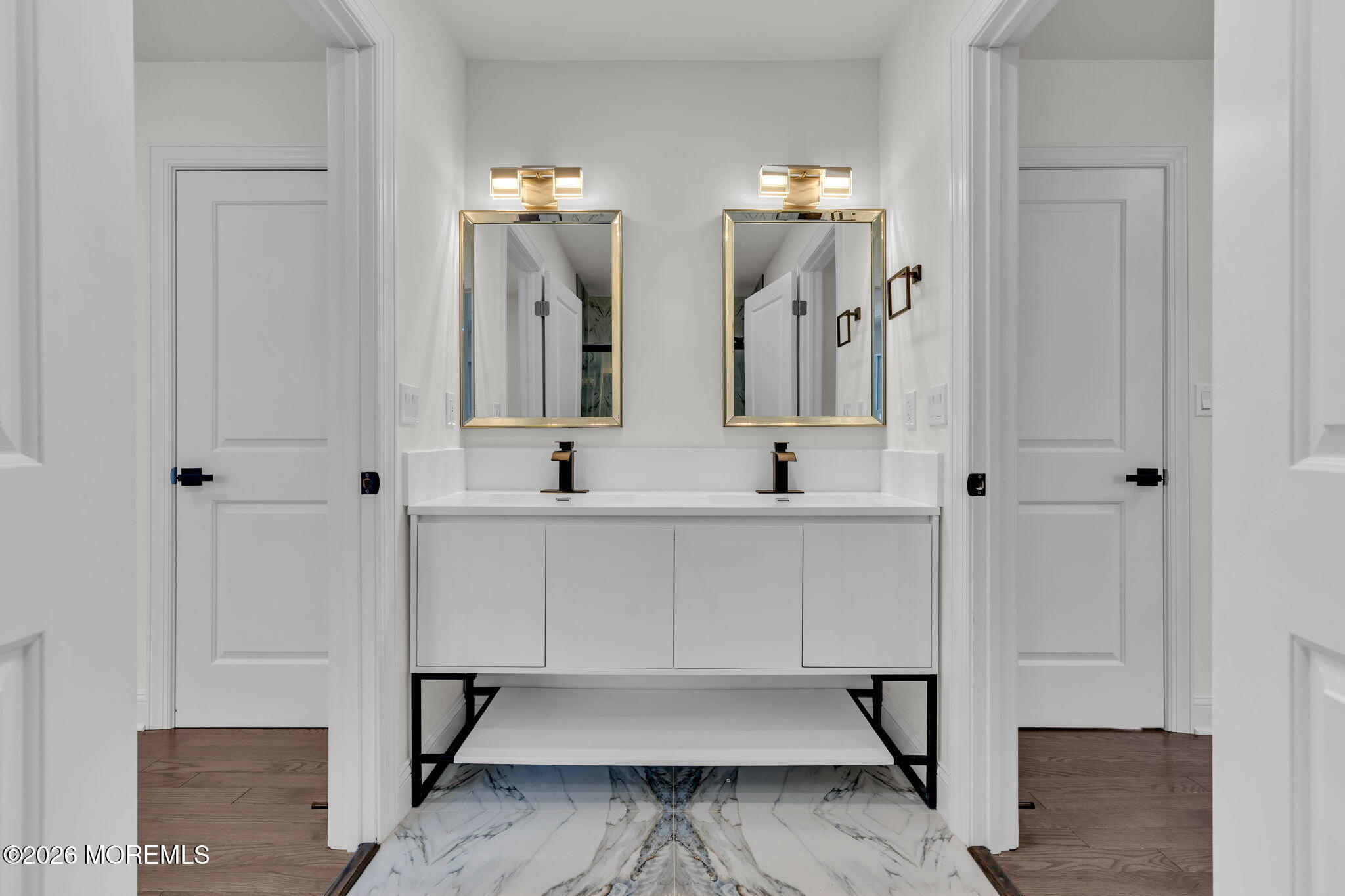 58 Fish Hawk Drive Middletown, NJ 07748 - Photo 20 of 33 a bathroom with double vanity sink and a mirror