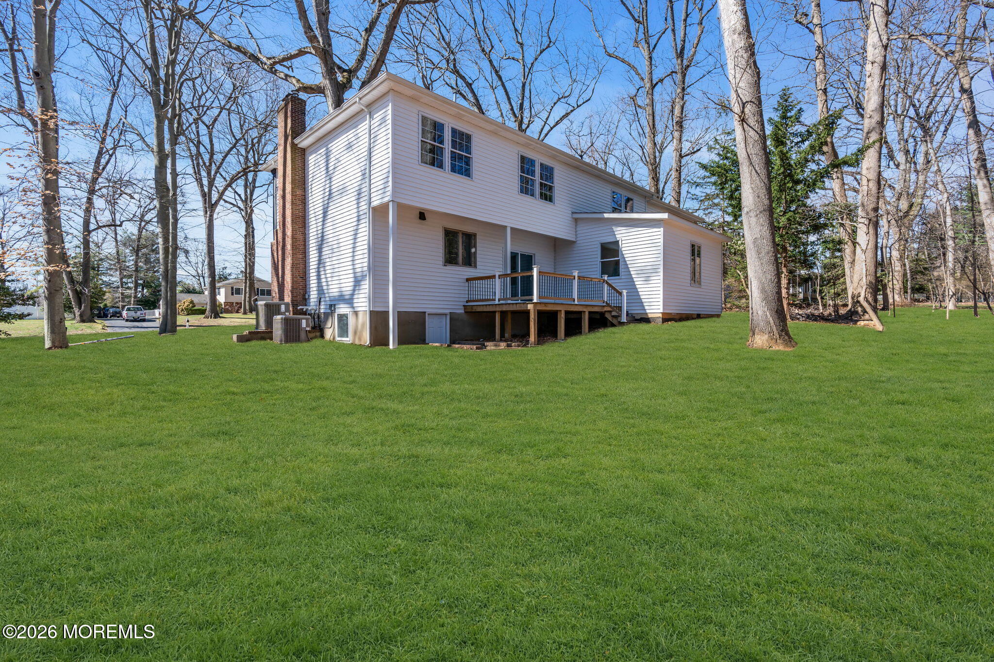 58 Fish Hawk Drive Middletown, NJ 07748 - Photo 24 of 33 a view of a house with a big yard and large trees