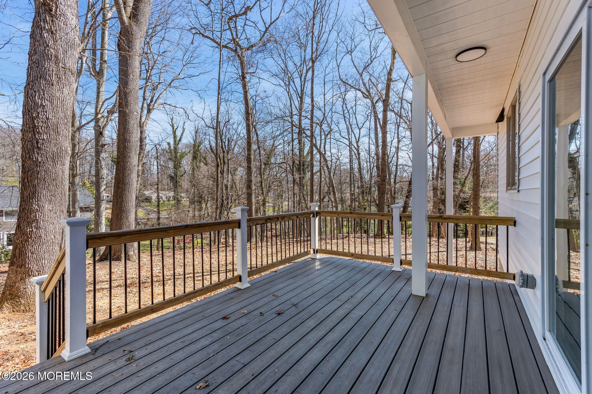 58 Fish Hawk Drive Middletown, NJ 07748 - Photo 25 of 33 a view of a balcony with wooden floor