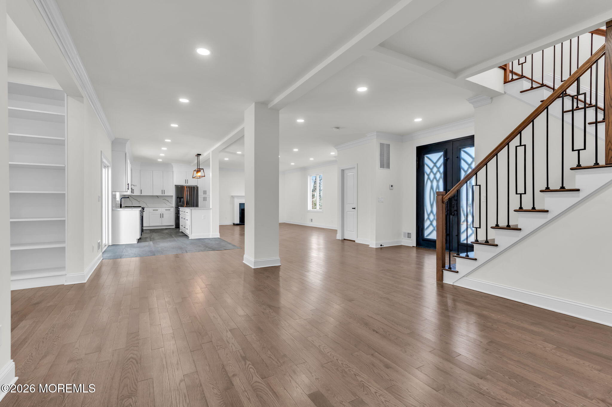58 Fish Hawk Drive Middletown, NJ 07748 - Photo 33 of 33 a view of a hallway with wooden floor and staircase