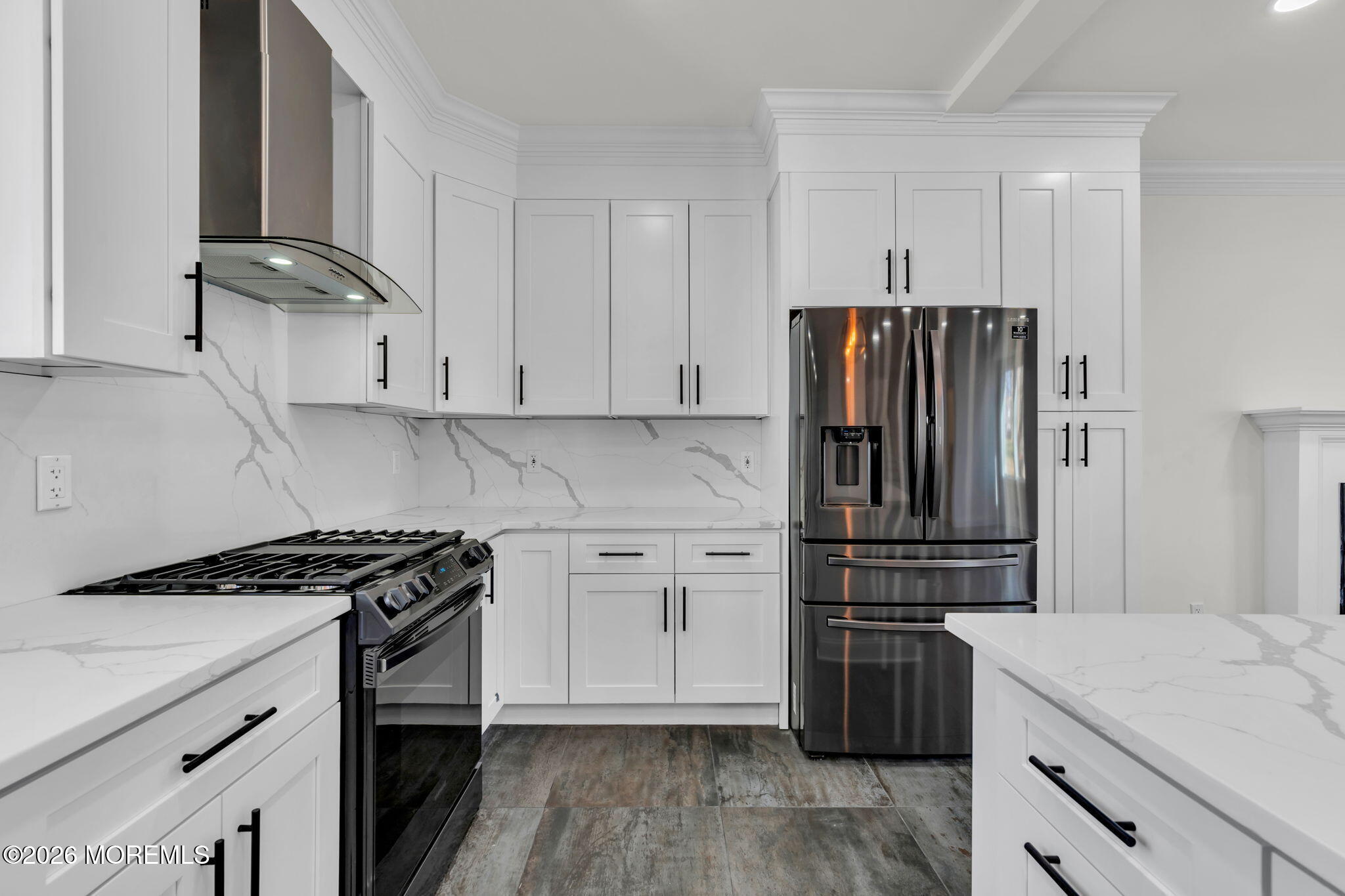 58 Fish Hawk Drive Middletown, NJ 07748 - Photo 6 of 33 a kitchen with stainless steel appliances a refrigerator stove and sink