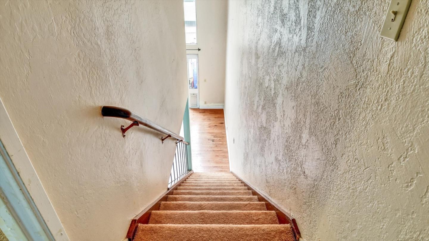 1201 Terra Nova Boulevard Pacifica, CA 94044 - Photo 15 of 28 a view of a hallway with a white walls
