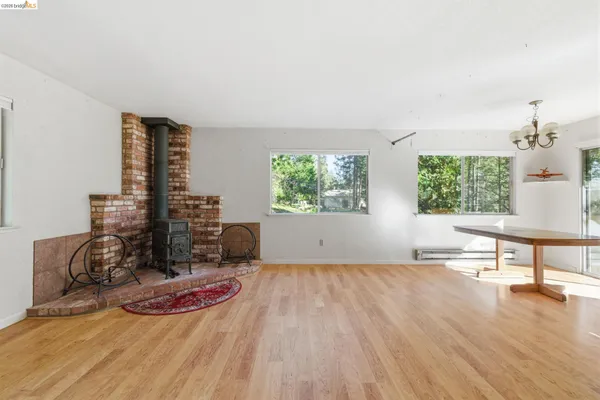 a room with a bed and window