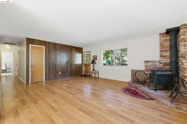 a view of workspace with furniture and window