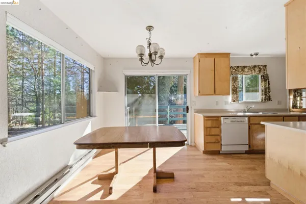 a living room with granite countertop furniture and a floor to ceiling window