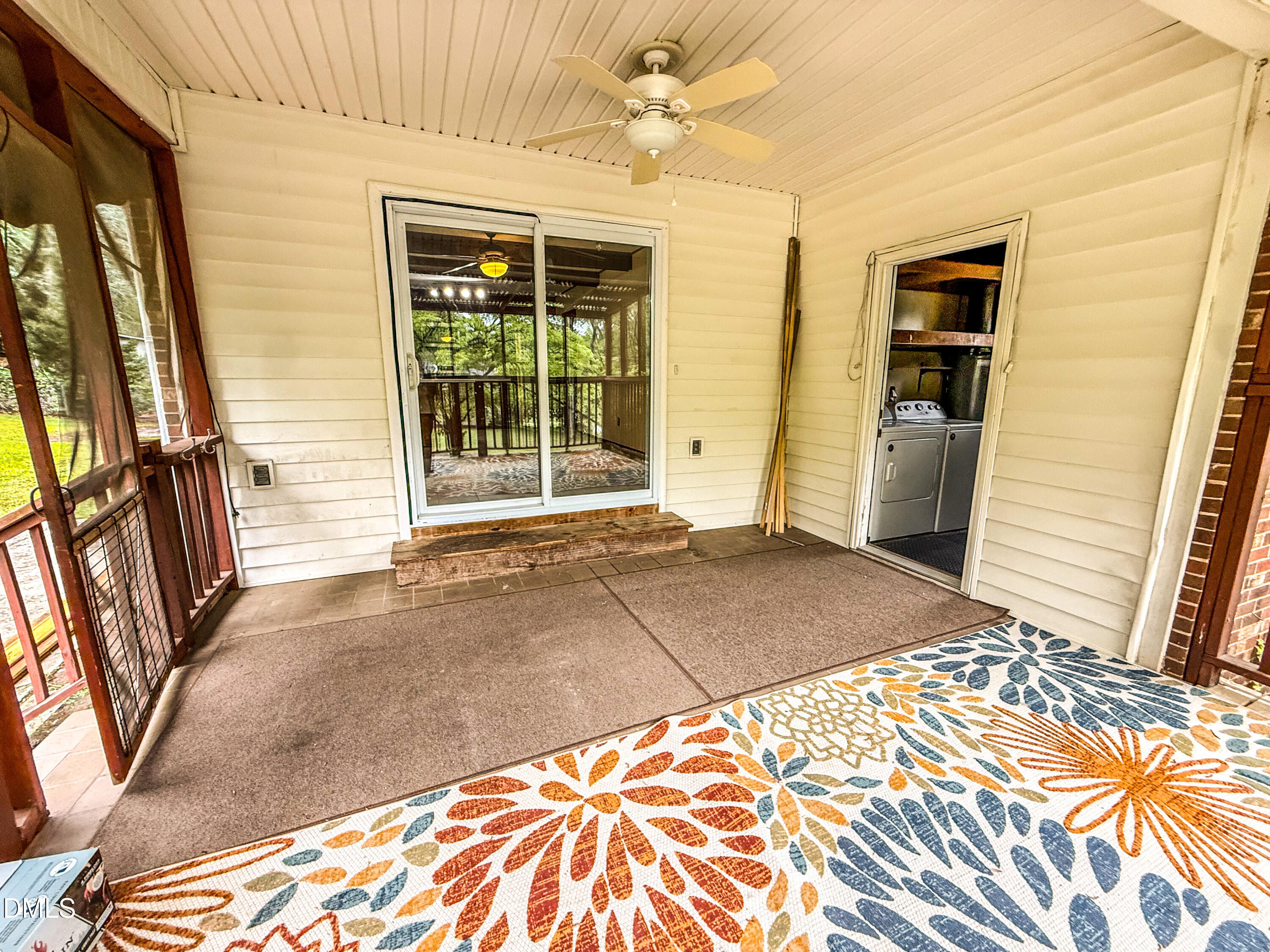 4717 Radcliff Road Raleigh, NC 27609 - Photo 10 of 11 a view of a bedroom with wooden floor and a ceiling fan