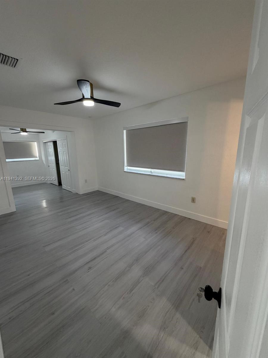3030 Southwest 96th Avenue Miami, FL 33165 - Photo 16 of 33 wooden floor in an empty room