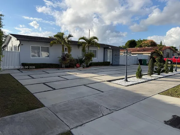 a view of a house with entertaining space