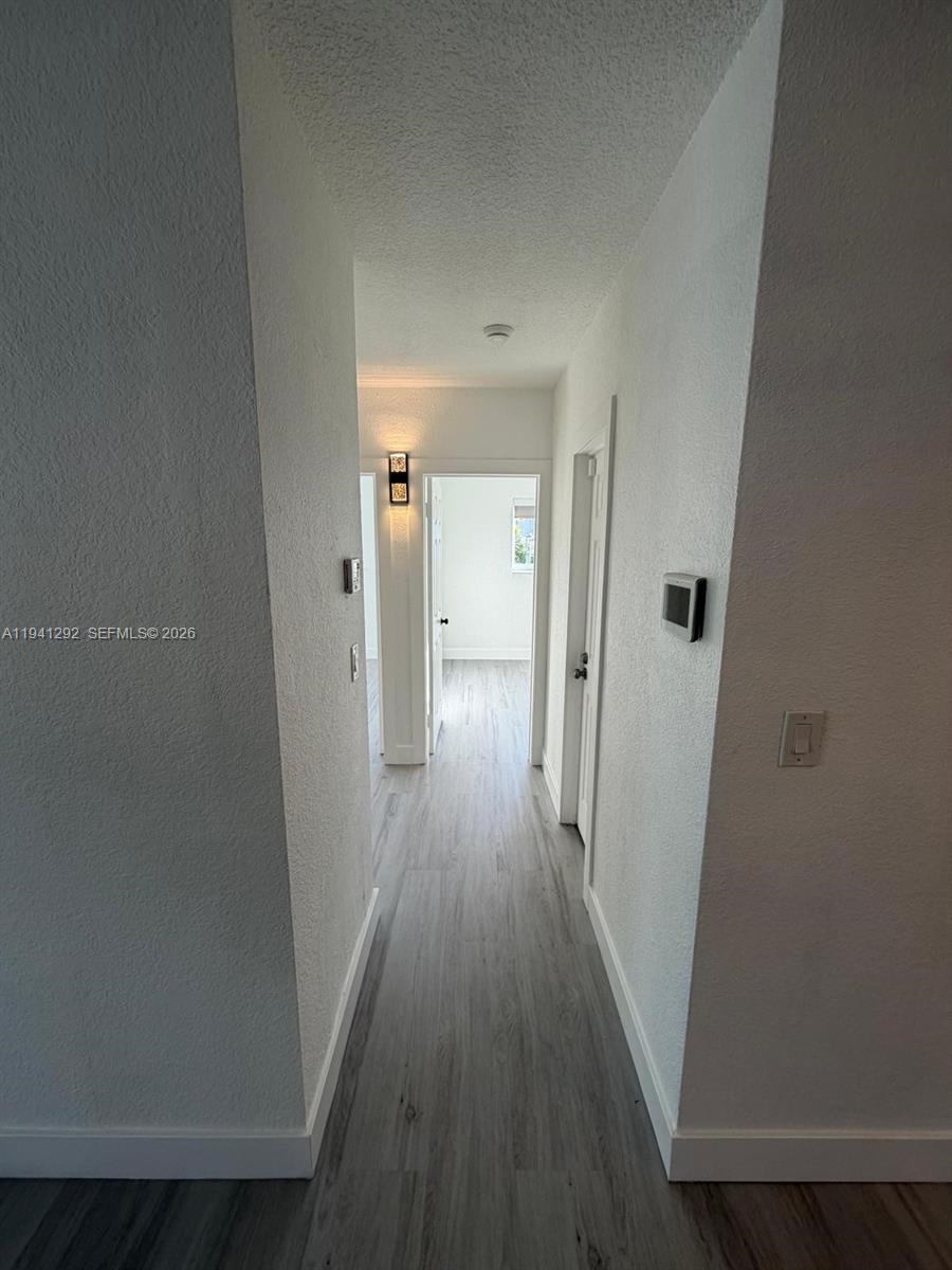 3030 Southwest 96th Avenue Miami, FL 33165 - Photo 24 of 33 wooden floor in a gallery