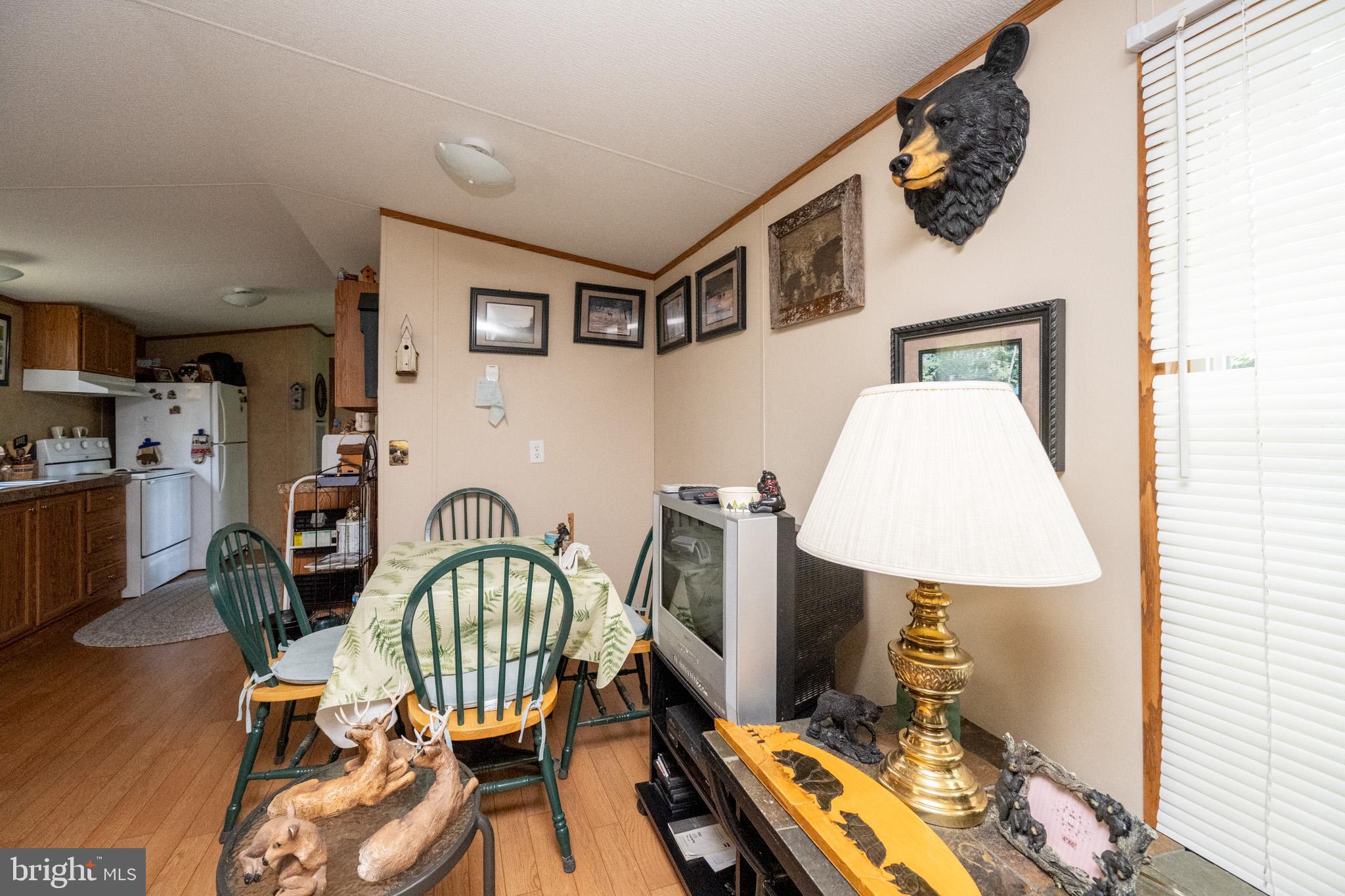 6932 New Germany Road Grantsville, MD 21536 - Photo 12 of 31 Cozy cabin retreat with rustic charm.