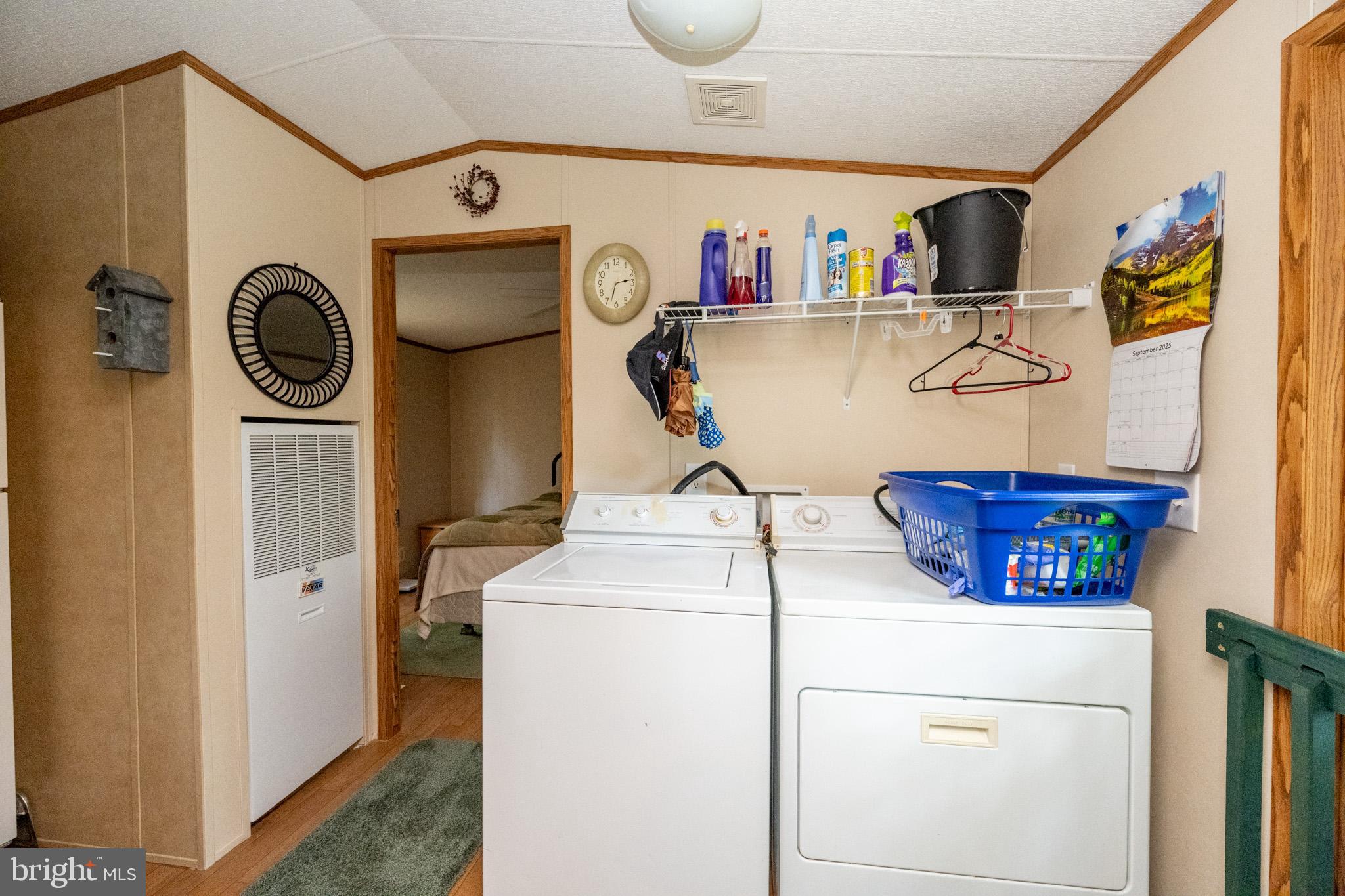 6932 New Germany Road Grantsville, MD 21536 - Photo 28 of 31 Functional laundry space with organized essenti...