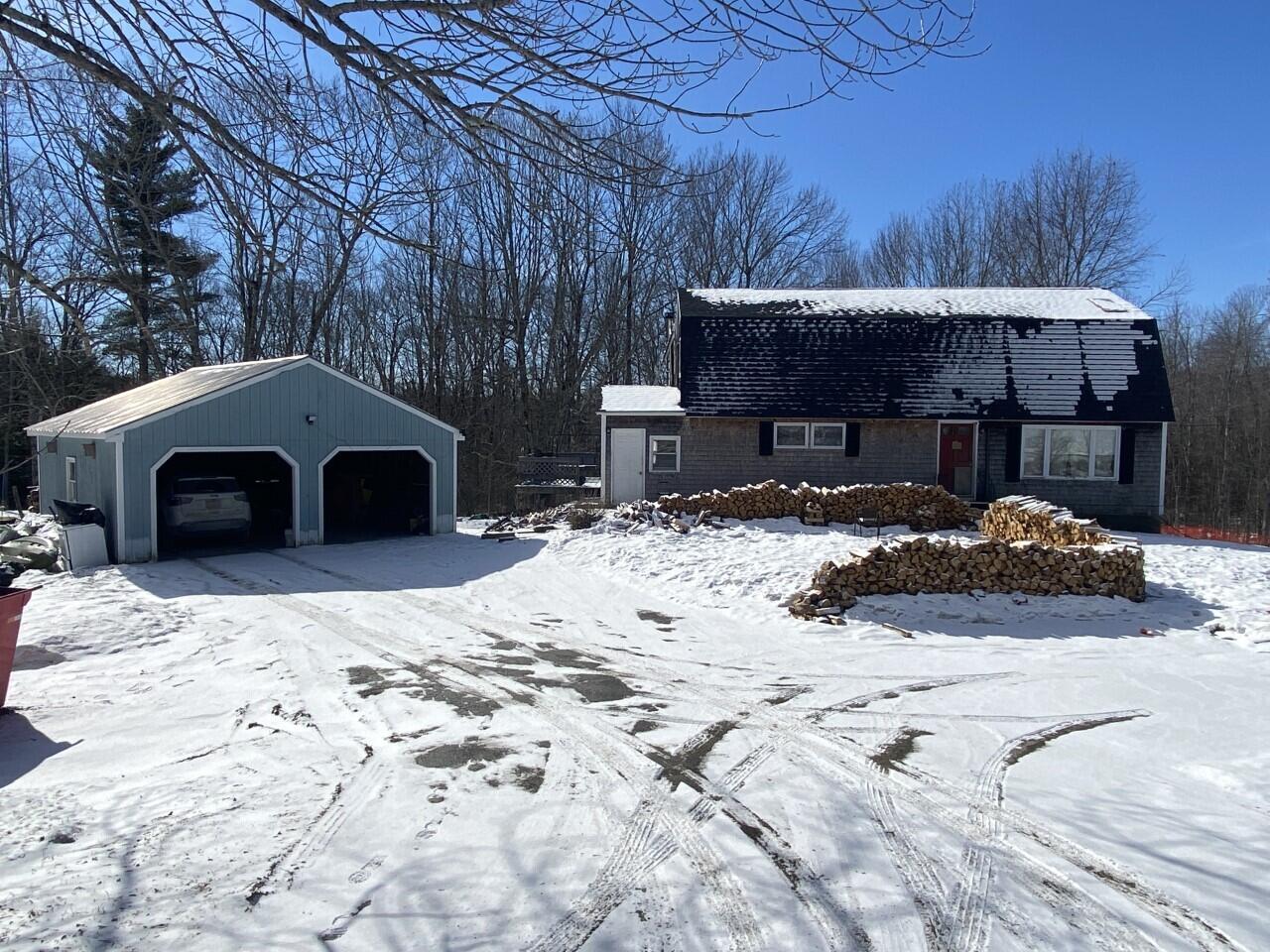 176 Bryant Road Freedom, ME 04941 - Photo 1 of 6 Front of home and garage