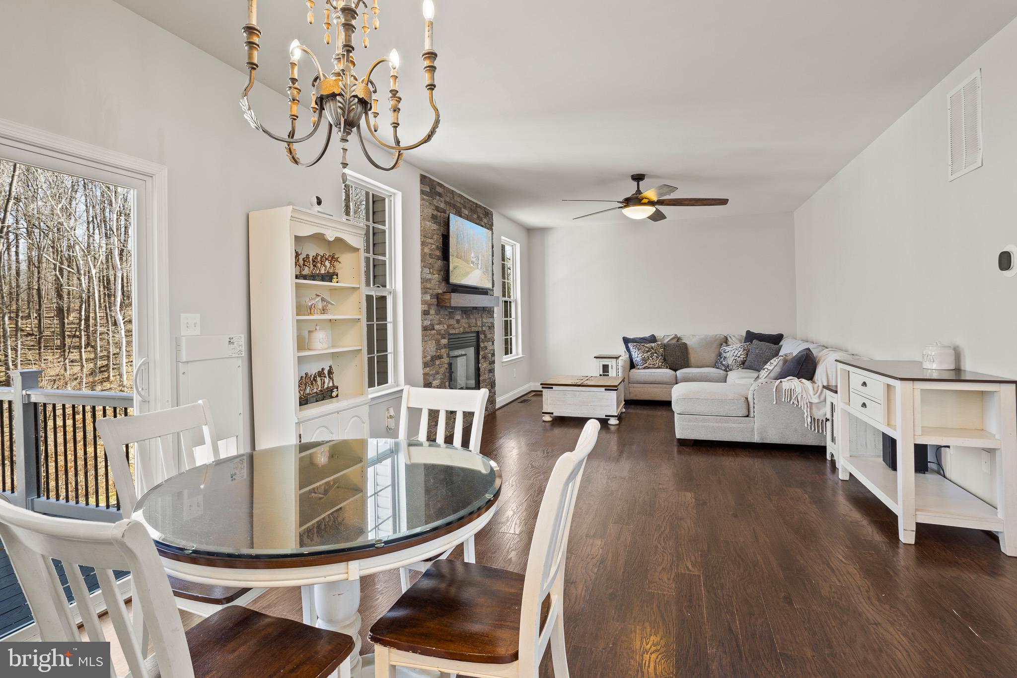 4335 Pleasant Court Huntingtown, MD 20639 - Photo 46 of 46 a living room with furniture and wooden floor