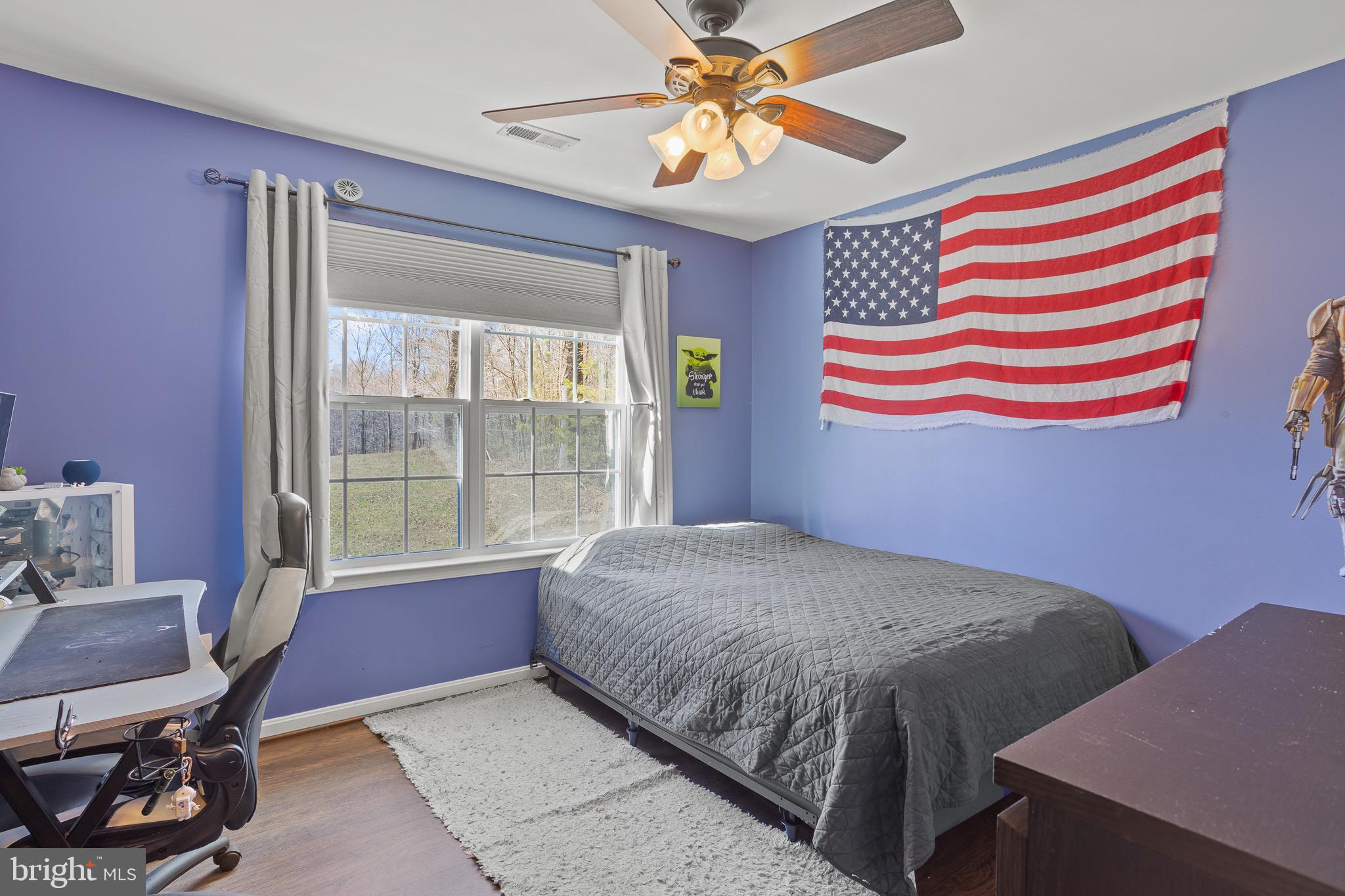 4335 Pleasant Court Huntingtown, MD 20639 - Photo 24 of 46 a bedroom with a bed and a window