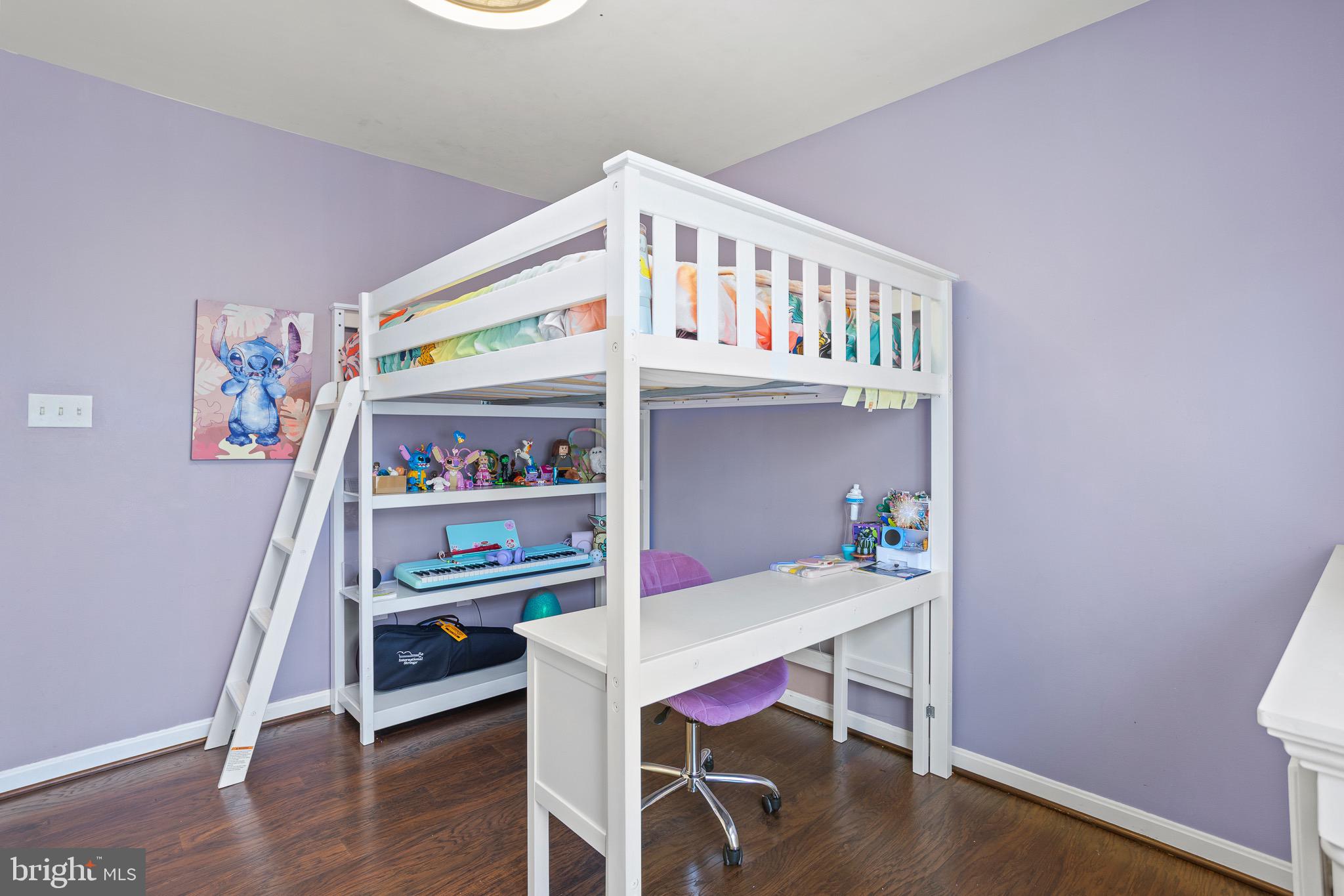 4335 Pleasant Court Huntingtown, MD 20639 - Photo 29 of 46 a bedroom with a bed and a table