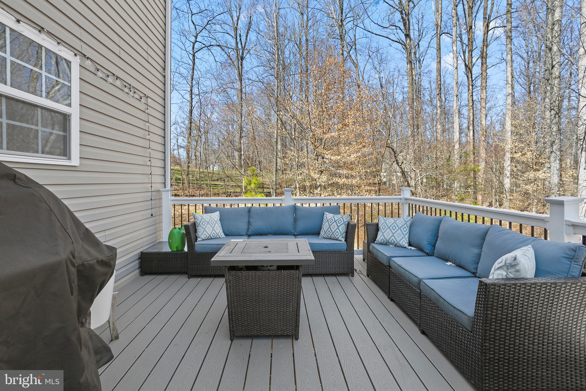 4335 Pleasant Court Huntingtown, MD 20639 - Photo 34 of 46 a balcony with wooden floor and furniture