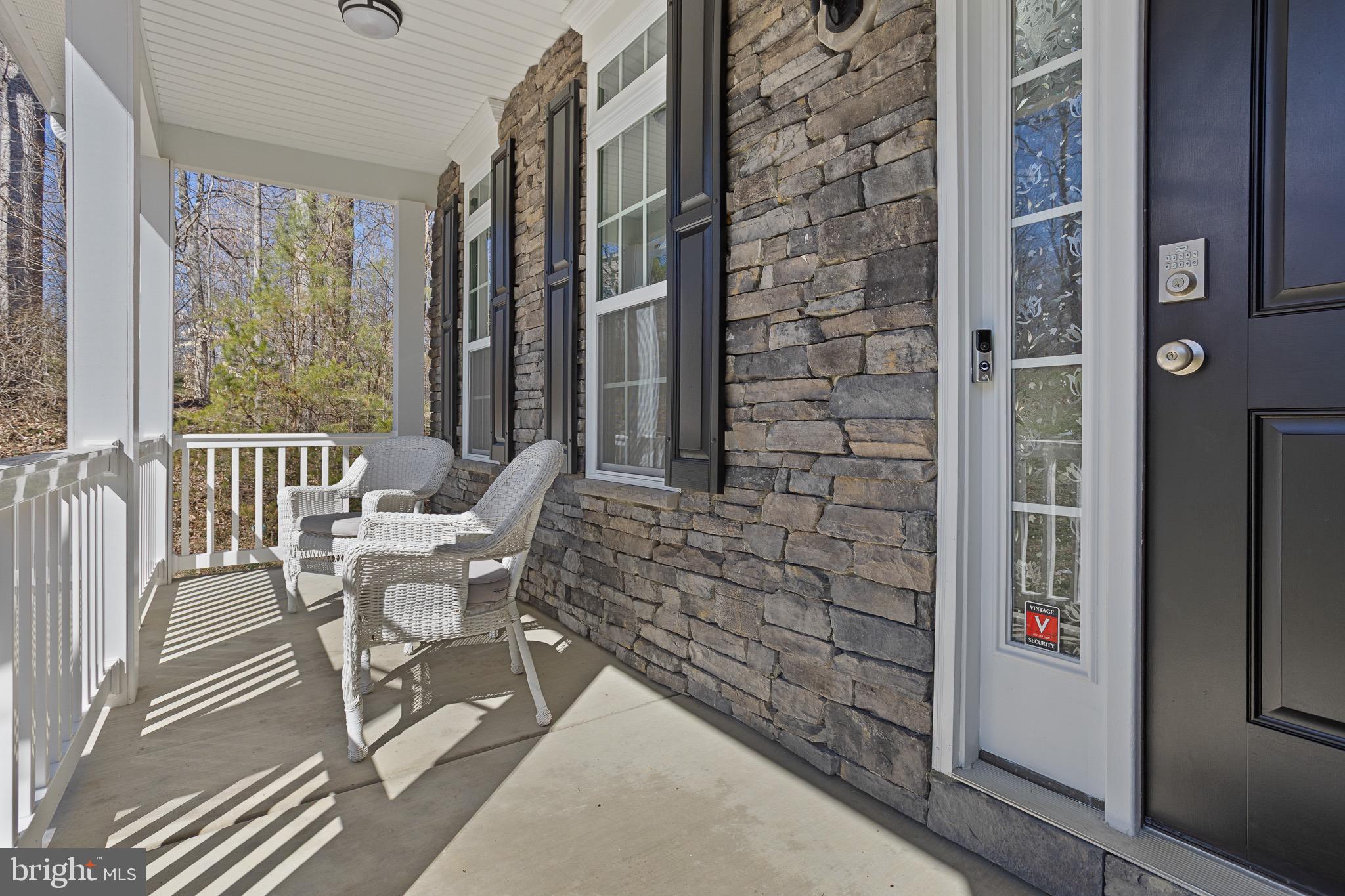 4335 Pleasant Court Huntingtown, MD 20639 - Photo 38 of 46 a balcony with chairs and outdoor space