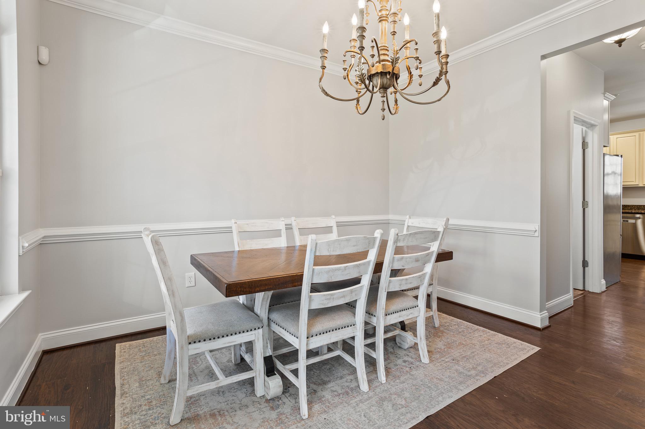4335 Pleasant Court Huntingtown, MD 20639 - Photo 4 of 46 a view of a dining room with furniture and wooden floor