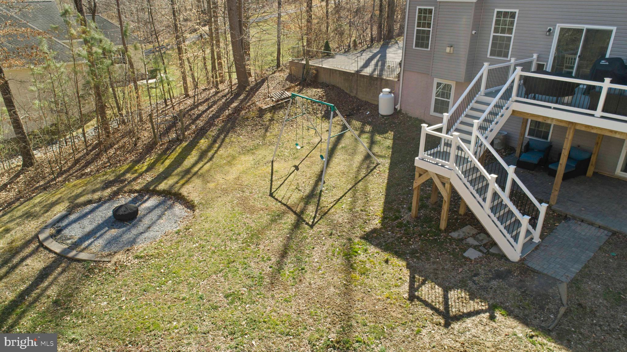 4335 Pleasant Court Huntingtown, MD 20639 - Photo 43 of 46 a backyard of a building with barbeque oven