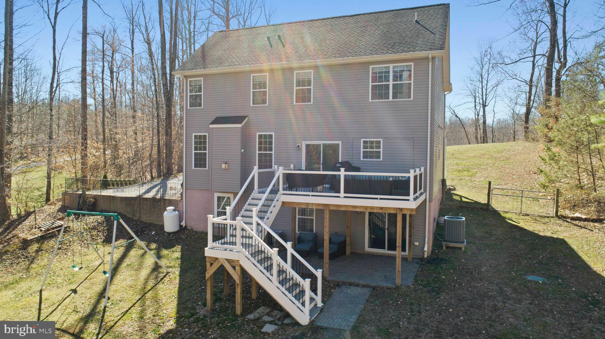 4335 Pleasant Court Huntingtown, MD 20639 - Photo 44 of 46 a front view of a house with a yard