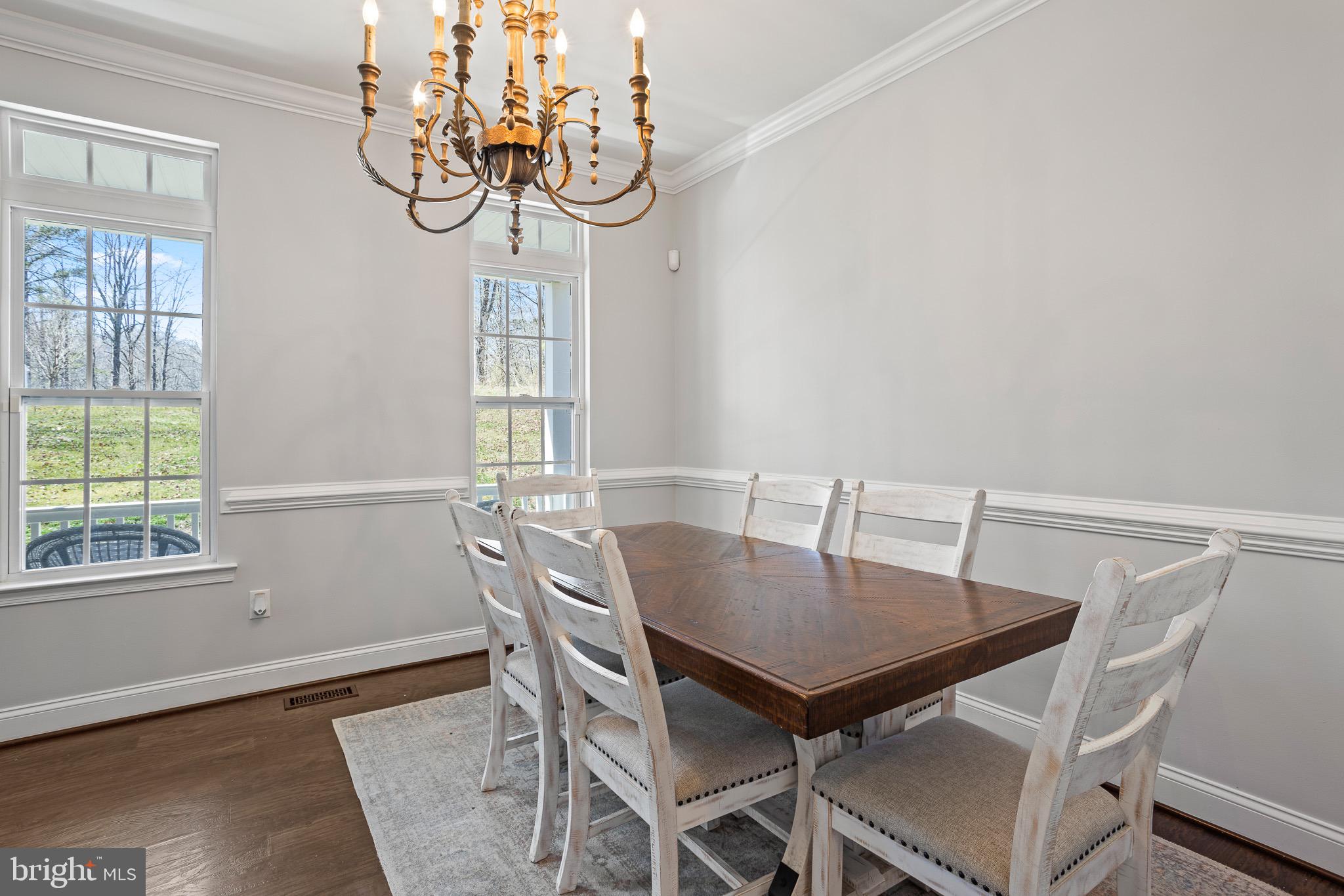 4335 Pleasant Court Huntingtown, MD 20639 - Photo 5 of 46 a view of a dining room with furniture window and outside view