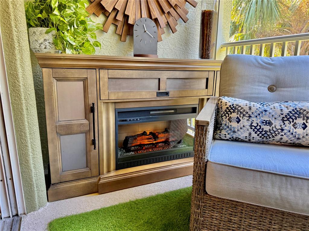 100 San Juan Drive, Unit A203 Palm Coast, FL 32137 - Photo 26 of 59 a front view of a house with a fireplace and a window