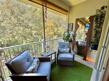 a view of a porch with furniture
