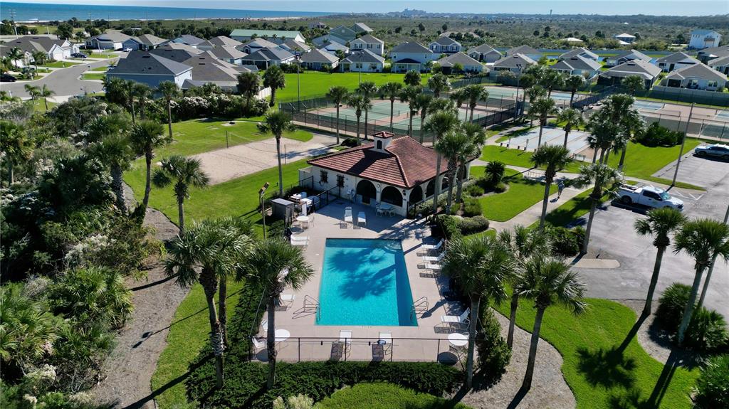 100 San Juan Drive, Unit A203 Palm Coast, FL 32137 - Photo 43 of 59 an aerial view of a house with a garden