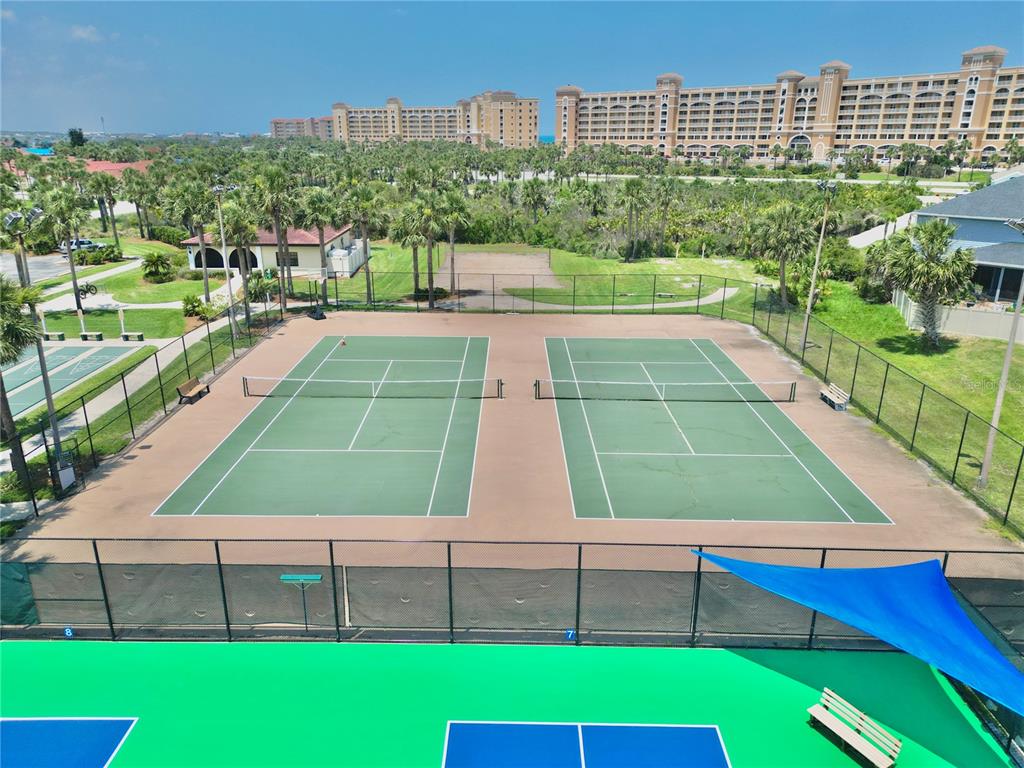 100 San Juan Drive, Unit A203 Palm Coast, FL 32137 - Photo 44 of 59 a view of a tennis court