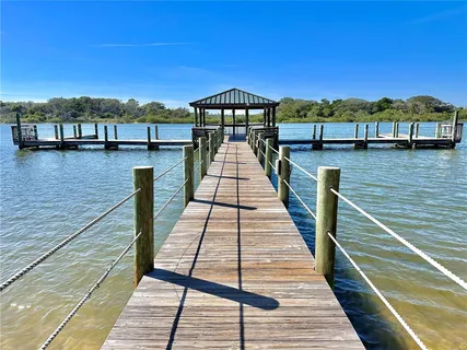 a view of a terrace with a lake view