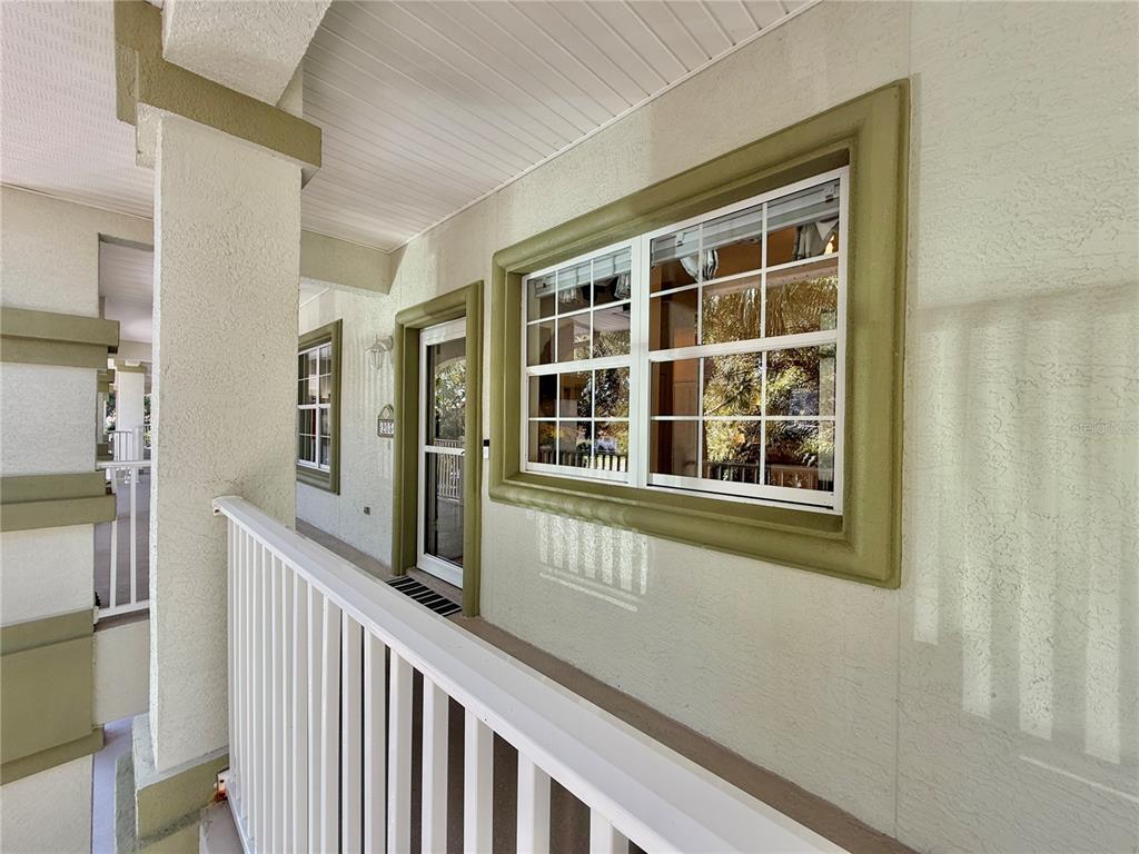 100 San Juan Drive, Unit A203 Palm Coast, FL 32137 - Photo 5 of 59 a view of a building from a balcony