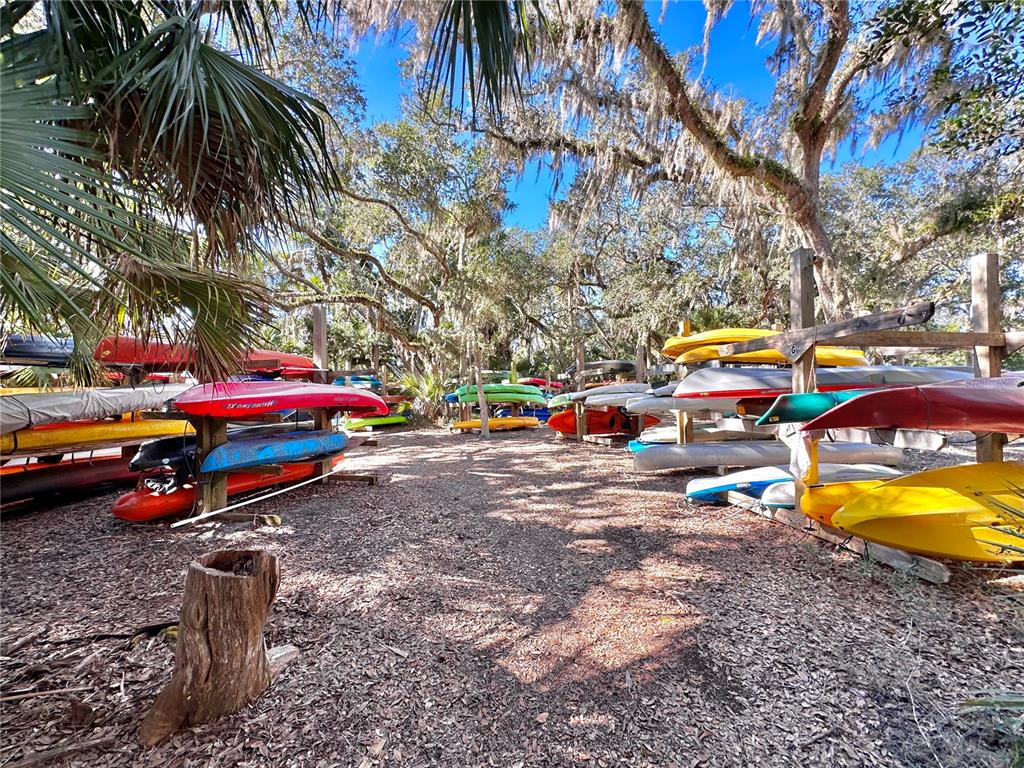 100 San Juan Drive, Unit A203 Palm Coast, FL 32137 - Photo 53 of 59 a yellow and red car parked in front of a house