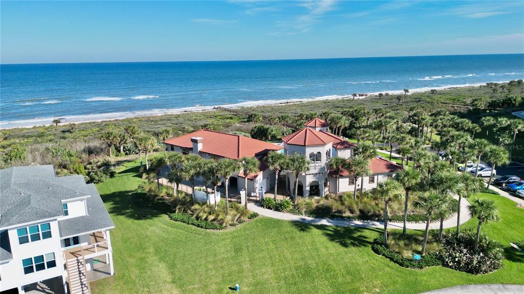 100 San Juan Drive, Unit A203 Palm Coast, FL 32137 - Photo 54 of 59 an aerial view of residential houses with outdoor space and ocean view