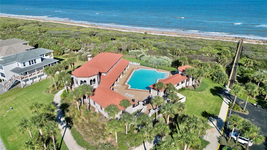 100 San Juan Drive, Unit A203 Palm Coast, FL 32137 - Photo 58 of 59 an aerial view of a house with a garden