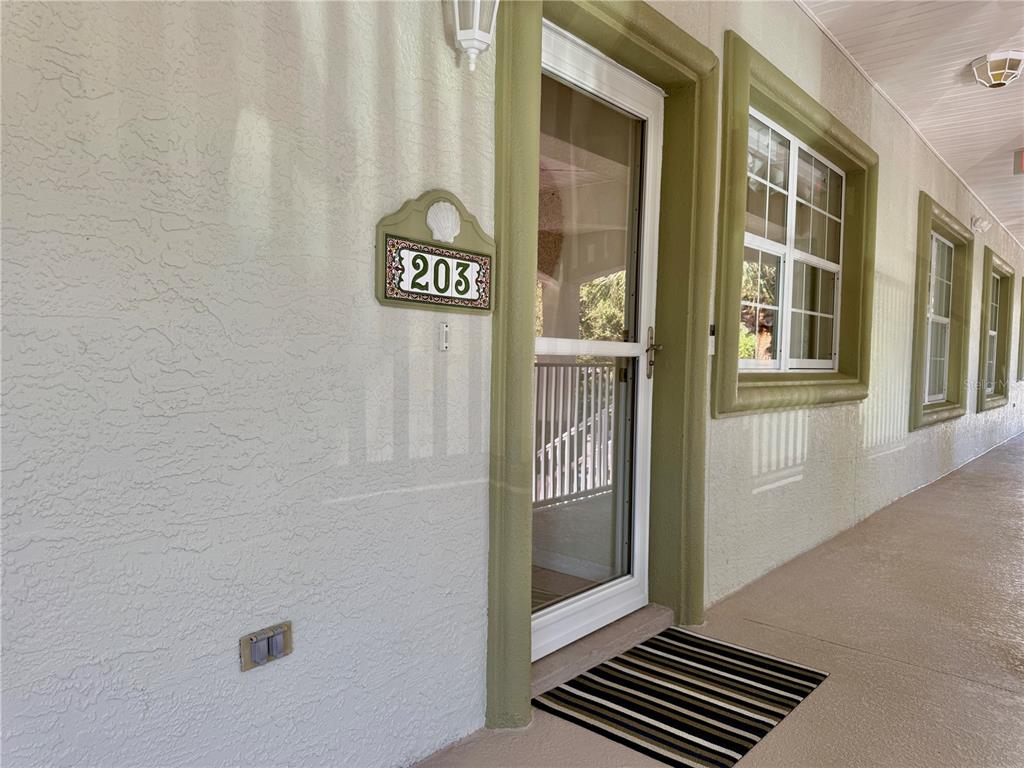 100 San Juan Drive, Unit A203 Palm Coast, FL 32137 - Photo 6 of 59 a view of an outdoor space