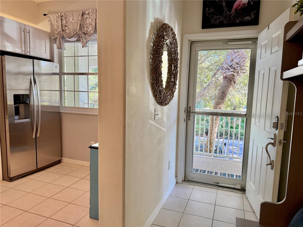 100 San Juan Drive, Unit A203 Palm Coast, FL 32137 - Photo 7 of 59 a view of a kitchen with a large window