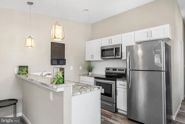 a bathroom with a shower and a toilet