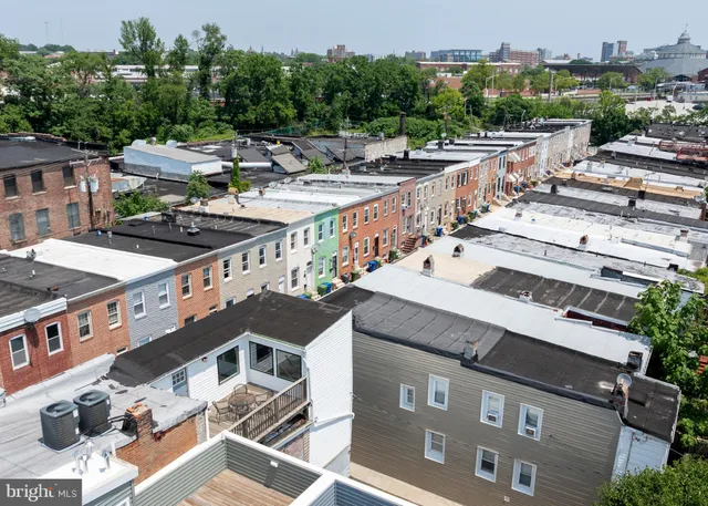 a view of outdoor space with wooden floor and chair