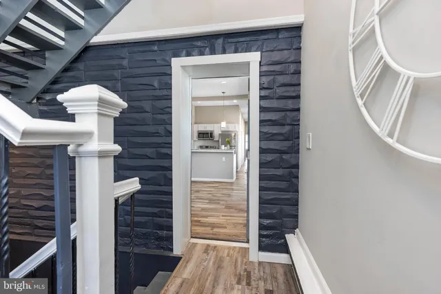 a kitchen with a sink and stove