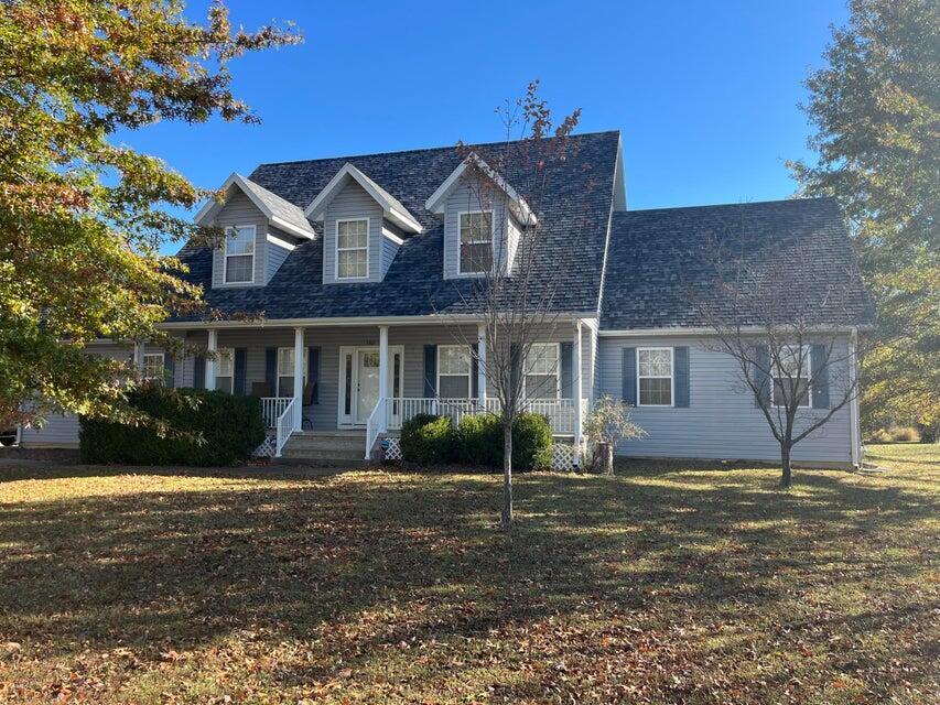 5302 South Old Wire Road Brookline, MO 65619 - Photo 1 of 1 old wire road front elevation