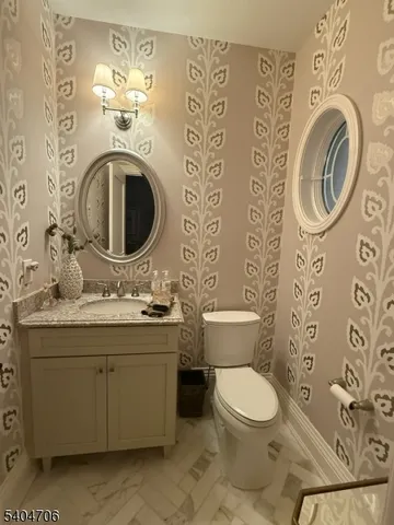 a room with furniture pool table and flat screen tv