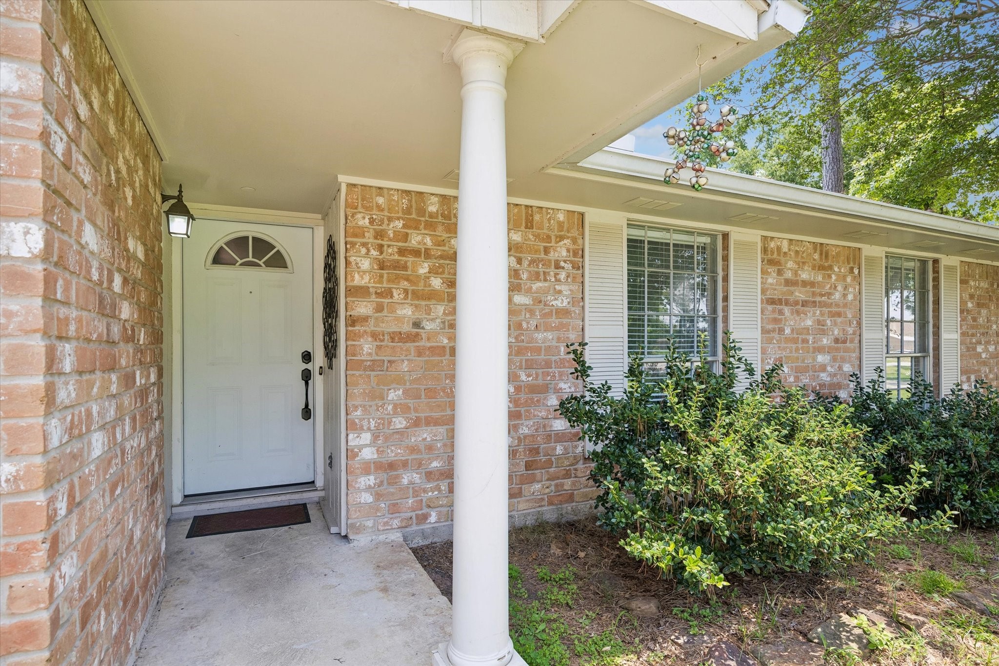 25114 Spring Ridge Drive Spring, TX 77386 - Photo 3 of 24 front view of a door with brick walls